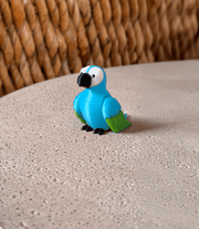 Cute 3D printed parrot toy 🦜✨ in vibrant blue with green wings, perfect for any animal lover's display!